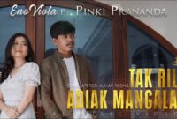Lirik lagu Minang terbaru yang berjudul Tak Rila Adiak Mangalah yang dinyanyikan oleh Eno Viola yang berduet dengan Pinki Prananda