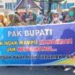 Perangkat nagari yang berdemonstrasi di depan Halaman Kantor Bupati Pesisir Selatan sambil membawa spanduk yang bertuliskan 
