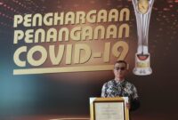Kepala Puskesmas Surantih usai menerima penghargaan penanganan COVID-19 di Jakarta