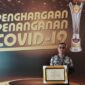 Kepala Puskesmas Surantih usai menerima penghargaan penanganan COVID-19 di Jakarta