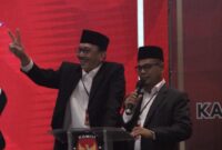 Pasangan Calon Bupati dan Wakil Bupati Pesisir Selatan nomor urut 2 Hendrajoni-Risnaldi Ibrahim saat tampil di Debat Publik Kedua  Pilkada Pessel 2024, Kamis (14/11/2024)