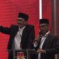 Pasangan Calon Bupati dan Wakil Bupati Pesisir Selatan nomor urut 2 Hendrajoni-Risnaldi Ibrahim saat tampil di Debat Publik Kedua  Pilkada Pessel 2024, Kamis (14/11/2024)