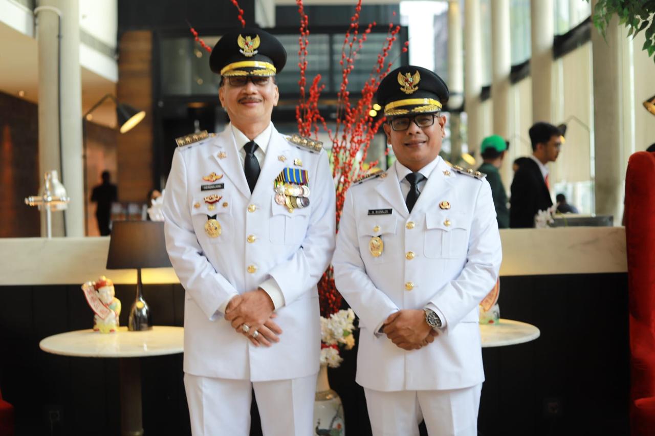 Hendrajoni dan Risnaldi Ibrahim