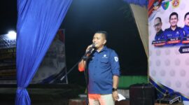 Ketua Karang Taruna Pesisir Selatan Nasrul menyampaikan sambutan dalam kegiatan HUT ke-66 dan Bulan Bakti Karang Taruna Kabupaten Pesisir Selatan 2026 di Carocok Painan, Sabtu (24/10/2026). Ia mengajak generasi muda memperkuat persatuan dan berkontribusi dalam pembangunan daerah.